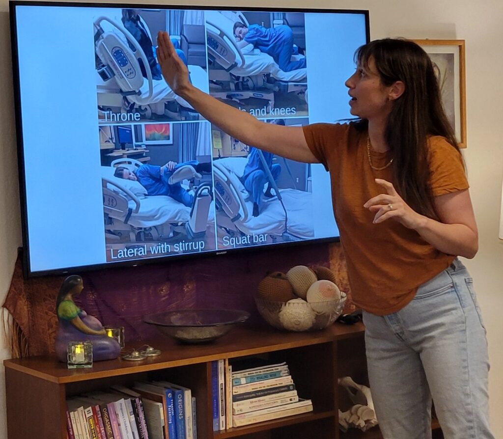 Brooklynn teaching uses of hospital bed to birth professionals