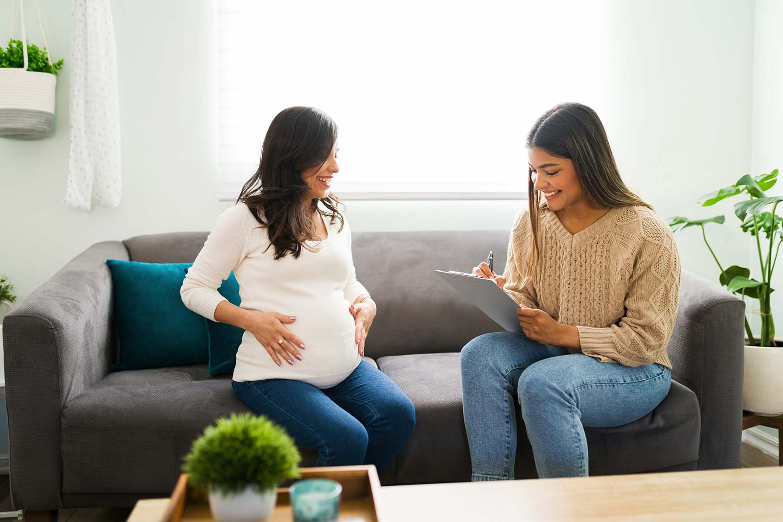 Happy expectant mother hired the services of a doula